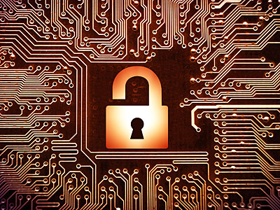 Ein Schloss-Symbol auf einem Hintergrund aus Leiterplatten.