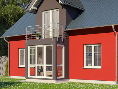 Ein rotes Haus mit grauem oberen Teil, großen Fenstern und einem kleinen Balkon.